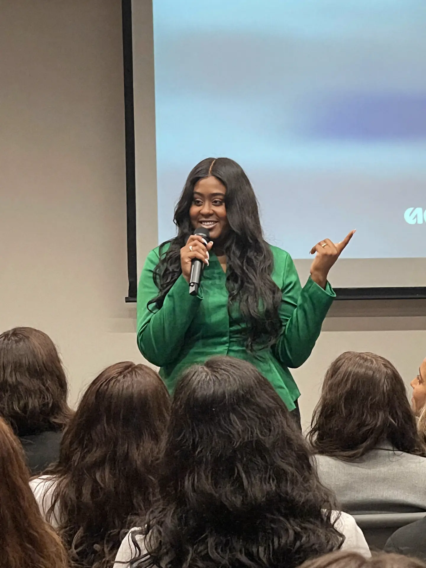 Latasha Williams, Founder and CEO of Modern Edge, speaking to an audience