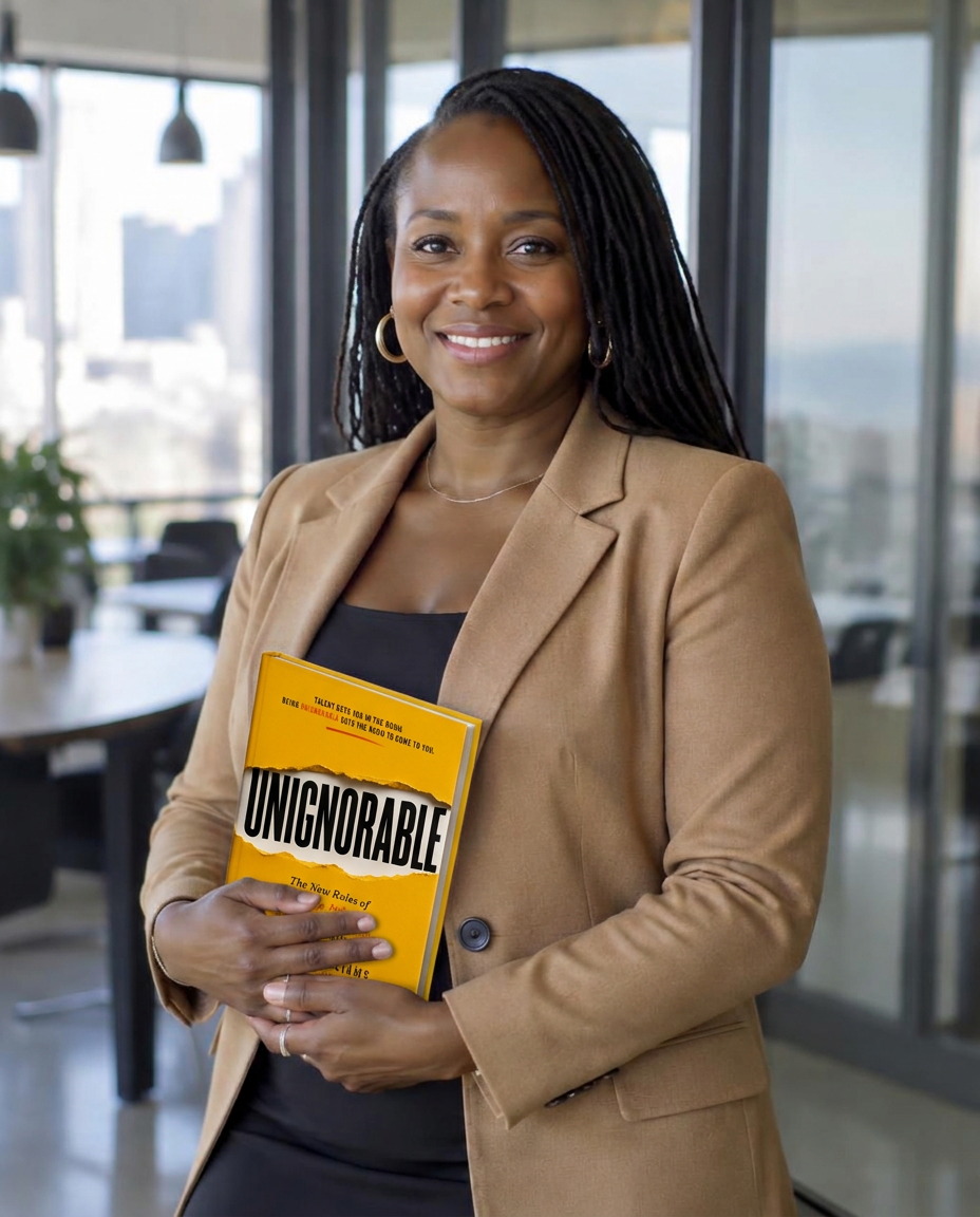 Professional woman holding the UNIGNORABLE book at work